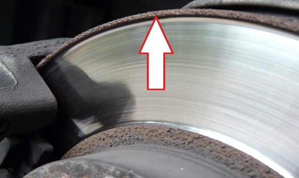 The abrasion of the brake pads creates a grade at the edges of the brake disc.