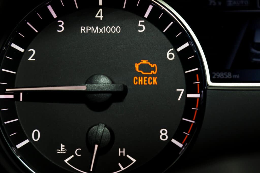 Illustration of a check engine light symbol on a car dashboard